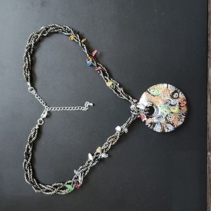 glass pendant floral necklace. This one has an adjustable clasp closure.